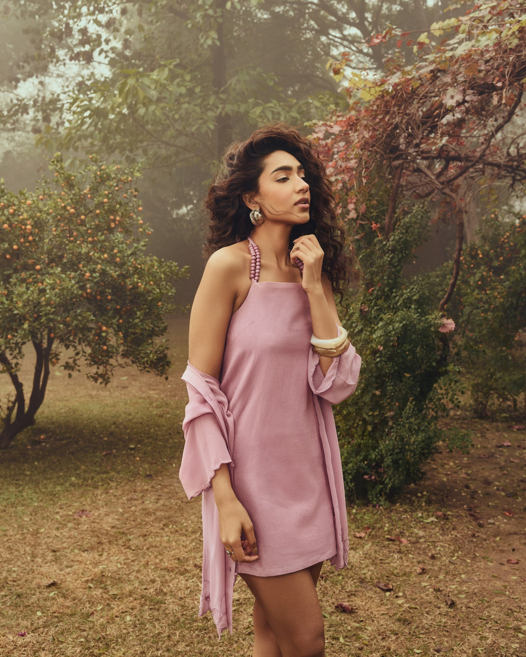 Stardust Dress Set in Rose — halter mini dress layered with sheer beaded Celestial Shirt, editorial garden look